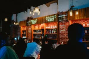 Inside chronic guru's lounge, patrons enjoy cannabis products together in a safe and fun environment