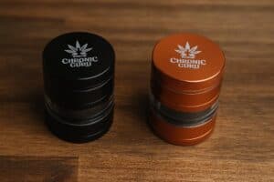black and Rose Gold Chronic Guru's 4-piece grinders