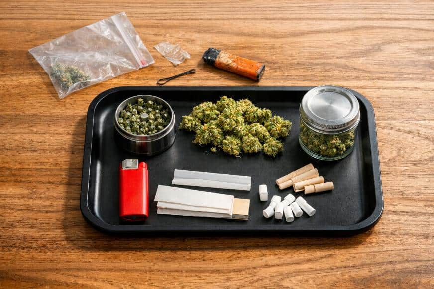 cannabis accessories checklist showing rolling tray grinder lighter and flower