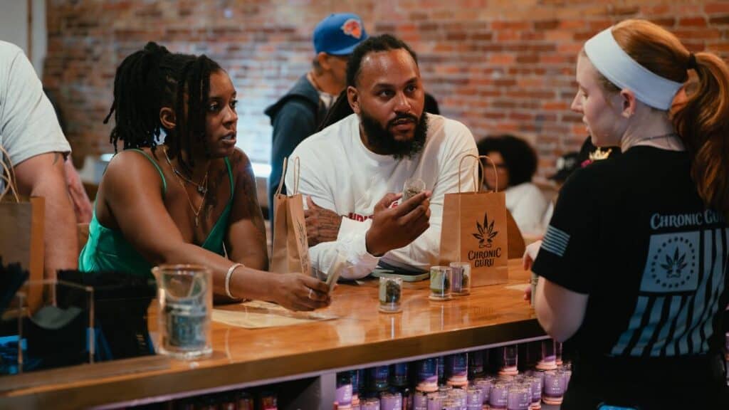 Customers discovering new cannabis products at Chronic Guru